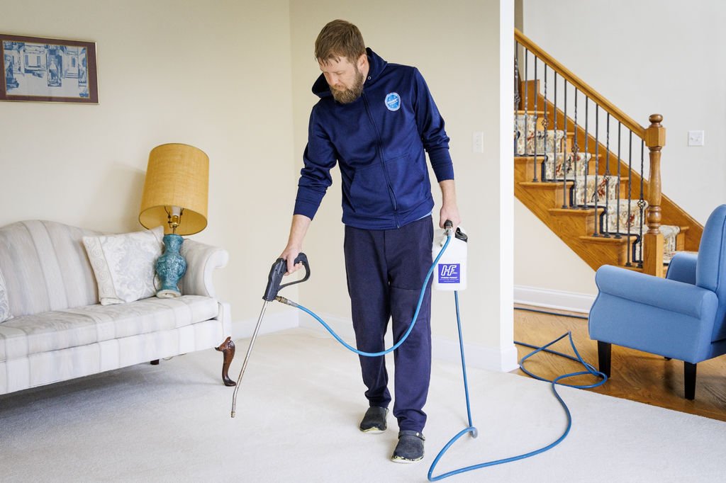 Ernest Steamers technician doing white carpet cleaning